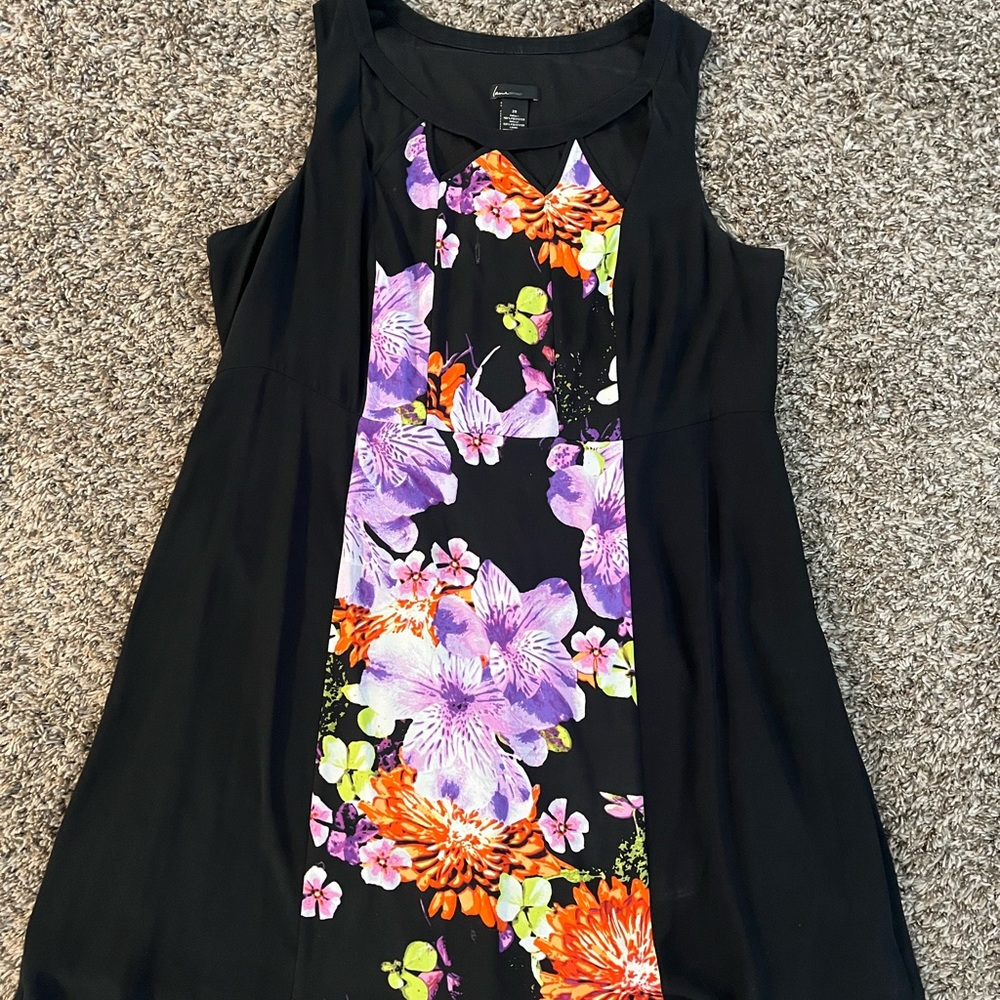 Just the right amount of florals. Nice cut out detail in the neckline.
